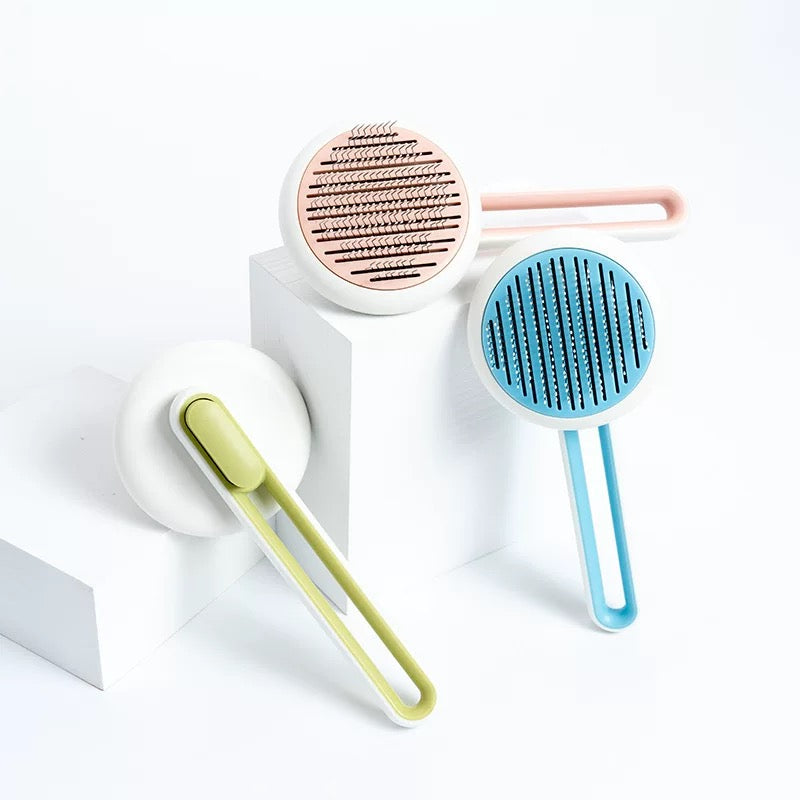 Peigne épilateur et massant automatique pour chats et chiens